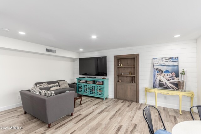 675 Val Verde Cir W, Litchfield Park, AZ 85340 - living area featuring light wood finished floors, recessed lighting, and baseboards
