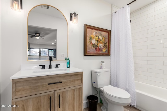 675 Val Verde Cir W, Litchfield Park, AZ 85340 - bathroom with toilet, vanity, a ceiling fan, and shower / bath combo