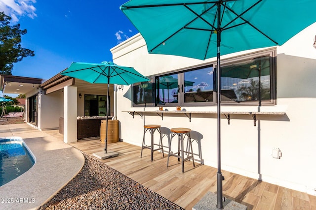 675 Val Verde Cir W, Litchfield Park, AZ 85340 - view of patio / terrace with an outdoor pool