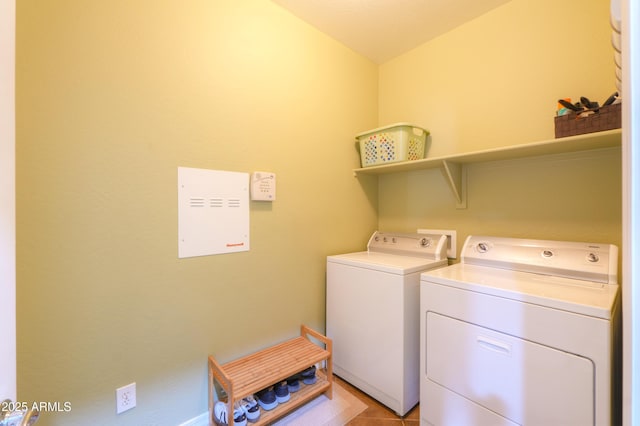 laundry area with laundry area and washer and clothes dryer