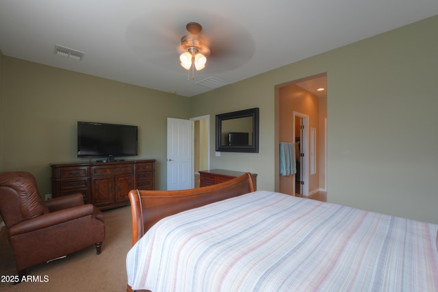 bedroom with visible vents, a ceiling fan, and light colored carpet