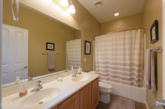 full bathroom with tile patterned flooring, visible vents, a sink, and double vanity