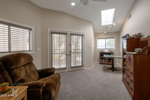 2125 E Elmwood St, Mesa, AZ 85213 - sitting room with vaulted ceiling, carpet, ceiling fan, a skylight, and baseboards