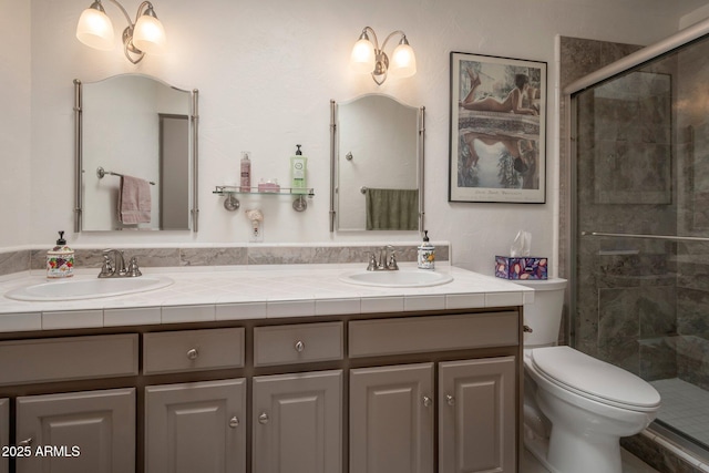 2125 E Elmwood St, Mesa, AZ 85213 - bathroom with double vanity, a stall shower, and toilet