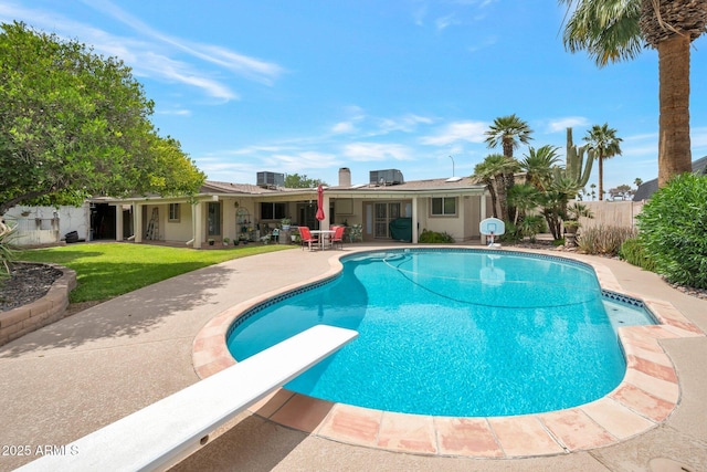 2125 E Elmwood St, Mesa, AZ 85213 - view of swimming pool featuring a patio, cooling unit, and a diving board