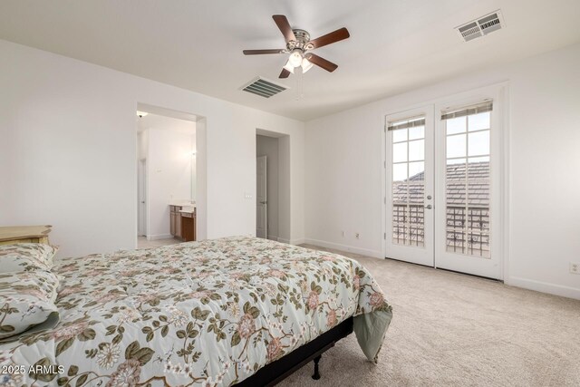 15469 W Dreyfus St, Surprise, AZ 85379 - carpeted bedroom featuring access to exterior, baseboards, ceiling fan, and ensuite bathroom
