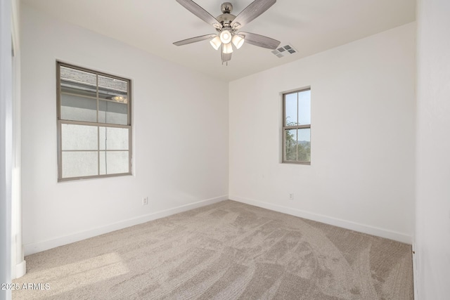 15469 W Dreyfus St, Surprise, AZ 85379 - carpeted empty room featuring baseboards and a ceiling fan
