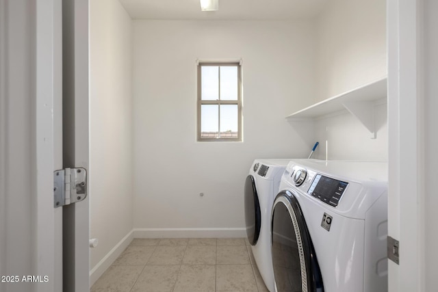15469 W Dreyfus St, Surprise, AZ 85379 - washroom featuring washer and dryer, baseboards, and light tile patterned flooring