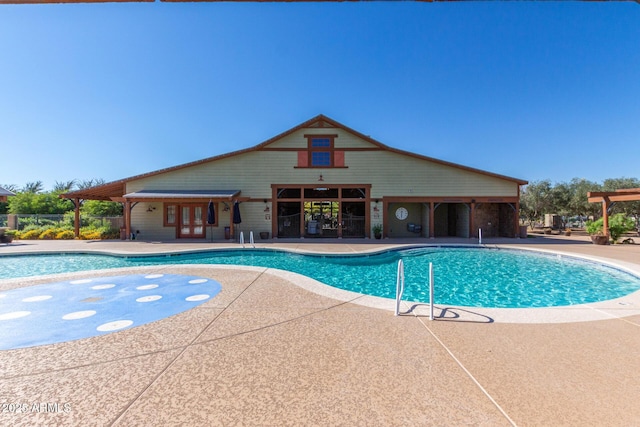 15469 W Dreyfus St, Surprise, AZ 85379 - community pool with french doors and a patio