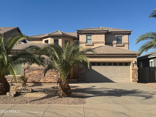 view of front of property featuring a garage