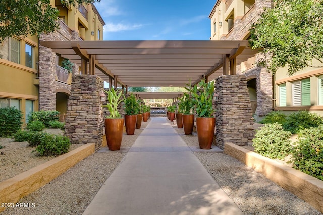 exterior space with a pergola