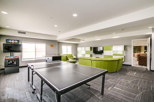 playroom with dark colored carpet