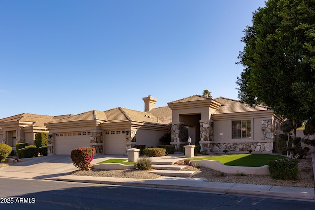 mediterranean / spanish house featuring a garage