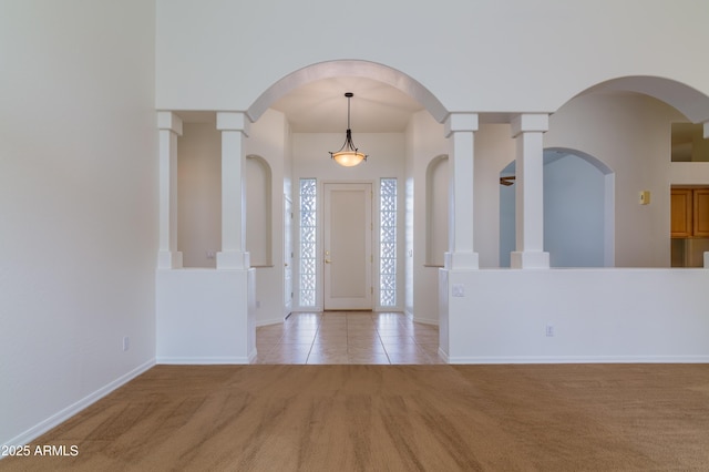 view of carpeted foyer