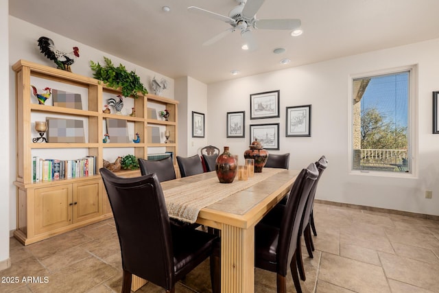 dining area with ceiling fan