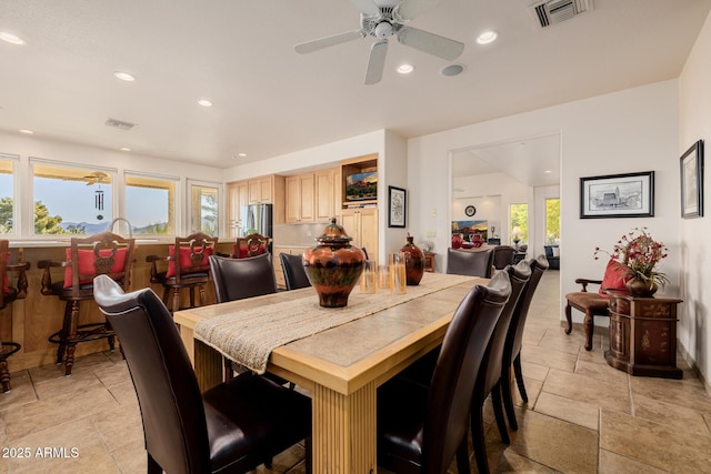 dining area featuring ceiling fan