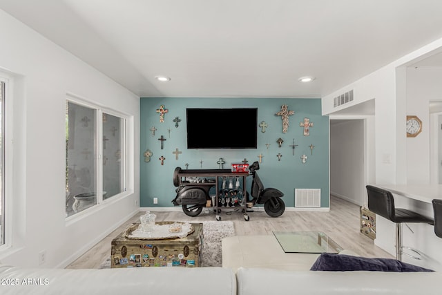 1814 W Thomas Rd, Phoenix, AZ 85015 - living area featuring wood finished floors, baseboards, and recessed lighting