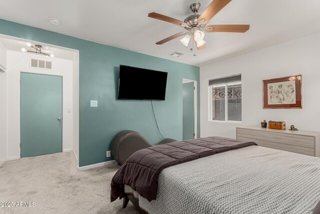 1814 W Thomas Rd, Phoenix, AZ 85015 - bedroom featuring light carpet, a ceiling fan, and baseboards