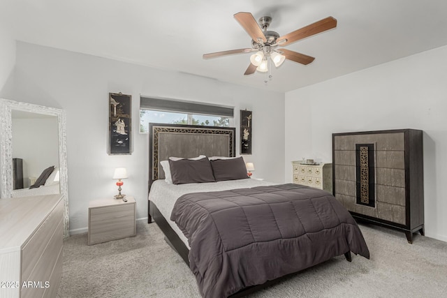 1814 W Thomas Rd, Phoenix, AZ 85015 - carpeted bedroom with baseboards and a ceiling fan