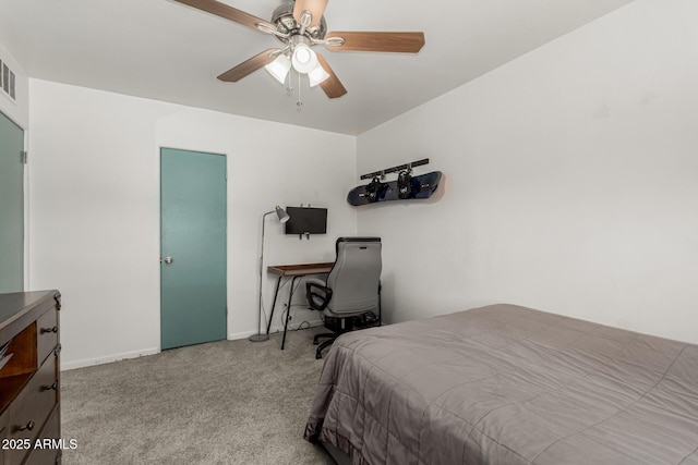 1814 W Thomas Rd, Phoenix, AZ 85015 - carpeted bedroom featuring a ceiling fan and baseboards