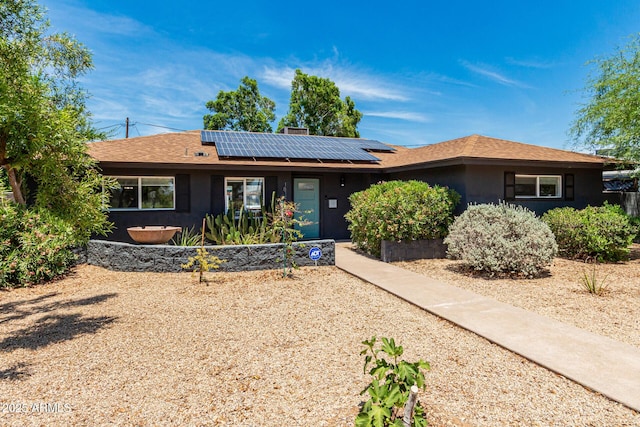 1814 W Thomas Rd, Phoenix, AZ 85015 - single story home with solar panels and stucco siding