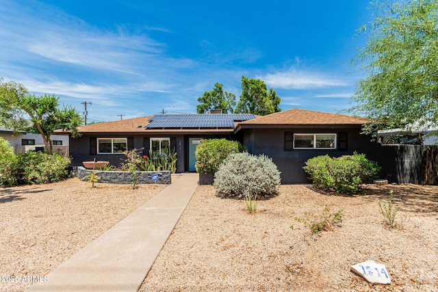 1814 W Thomas Rd, Phoenix, AZ 85015 - single story home with solar panels and stucco siding