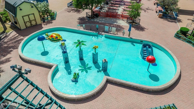 1814 W Thomas Rd, Phoenix, AZ 85015 - view of swimming pool with an outbuilding and a patio area