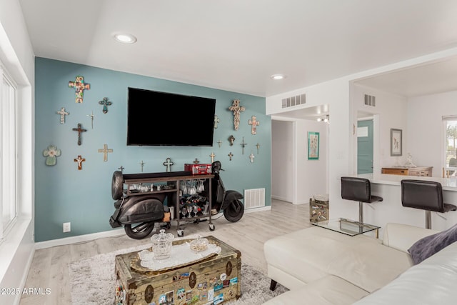 1814 W Thomas Rd, Phoenix, AZ 85015 - living room with wood finished floors, baseboards, and recessed lighting