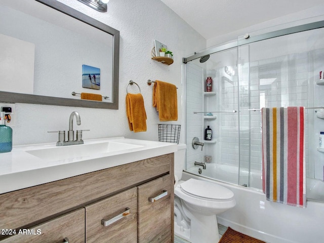 full bathroom featuring vanity, toilet, and enclosed tub / shower combo