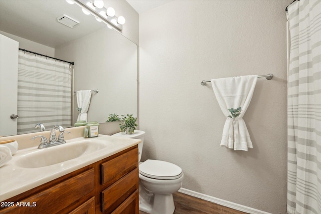 full bath featuring visible vents, toilet, wood finished floors, baseboards, and vanity