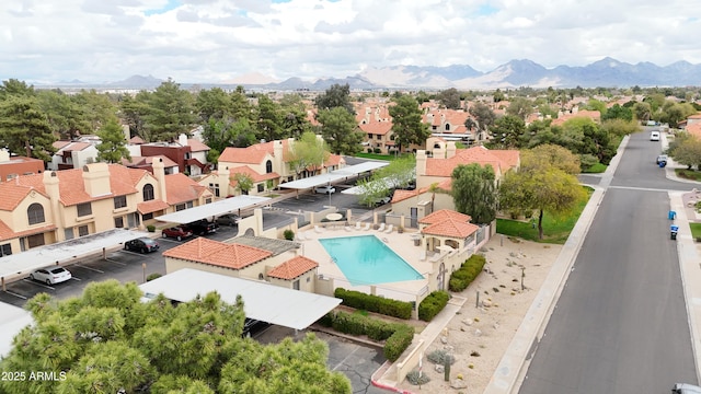 birds eye view of property featuring a mountain view and a residential view