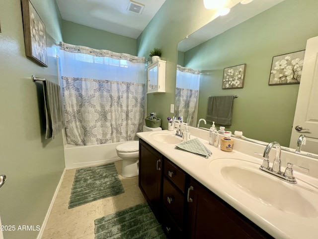 full bath featuring toilet, a sink, visible vents, and double vanity