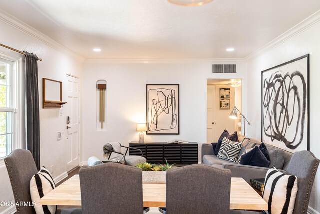 546 W Cambridge Ave, Phoenix, AZ 85003 - dining area featuring ornamental molding, wood finished floors, recessed lighting, and baseboards