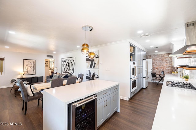 546 W Cambridge Ave, Phoenix, AZ 85003 - kitchen featuring beverage cooler, white appliances, open shelves, light countertops, and dark wood-style floors