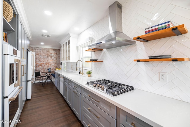 546 W Cambridge Ave, Phoenix, AZ 85003 - kitchen with open shelves, island range hood, gray cabinetry, a sink, and ornamental molding