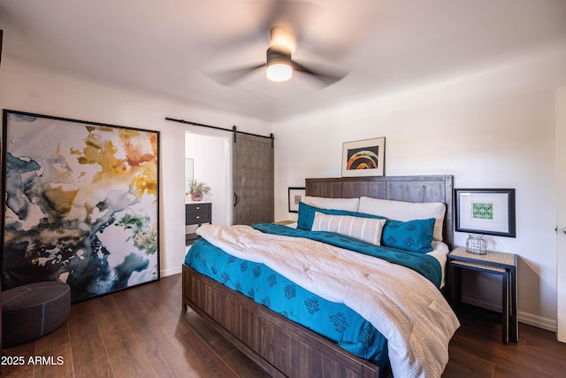 546 W Cambridge Ave, Phoenix, AZ 85003 - bedroom featuring wood finished floors, a barn door, baseboards, and ceiling fan