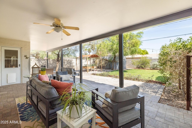 546 W Cambridge Ave, Phoenix, AZ 85003 - fenced backyard with outdoor lounge area, a patio, and a ceiling fan
