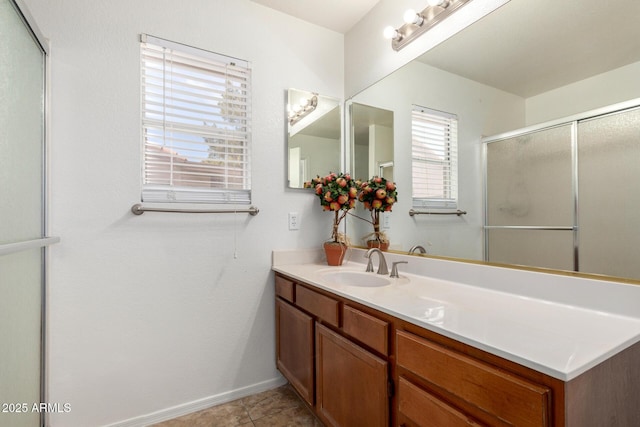626 W Catclaw St, Gilbert, AZ 85233 - bathroom with an enclosed shower, vanity, and baseboards