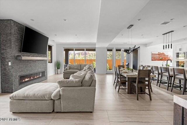 living room featuring a fireplace