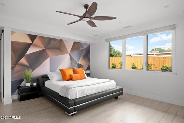 bedroom featuring ceiling fan