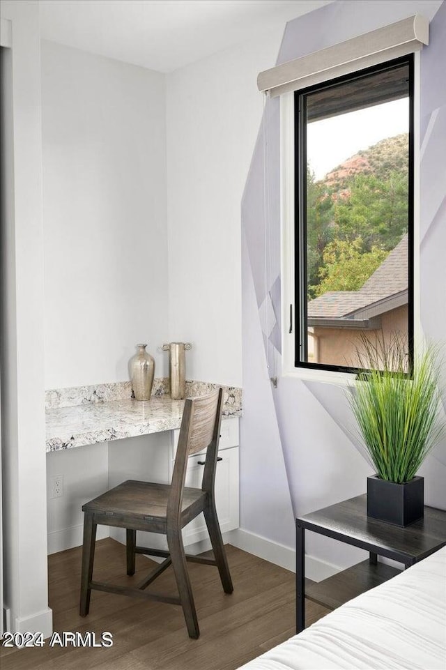 dining area featuring dark hardwood / wood-style floors