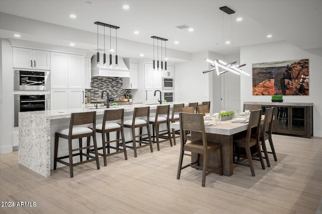 dining room featuring sink