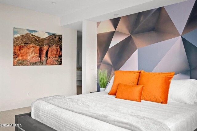 bedroom featuring hardwood / wood-style floors