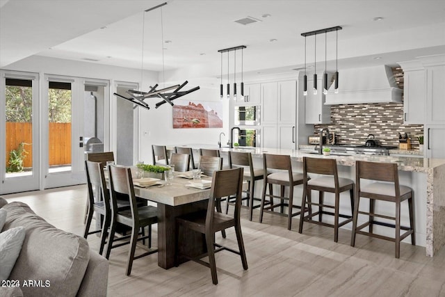 dining room featuring light hardwood / wood-style flooring