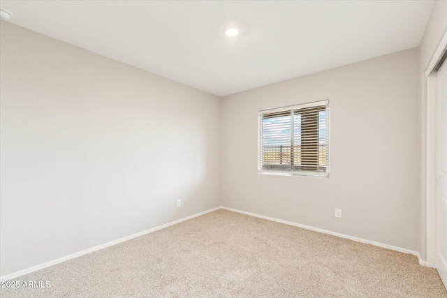 431 W Guinea Ct, Casa Grande, AZ 85122 - spare room with baseboards and light colored carpet