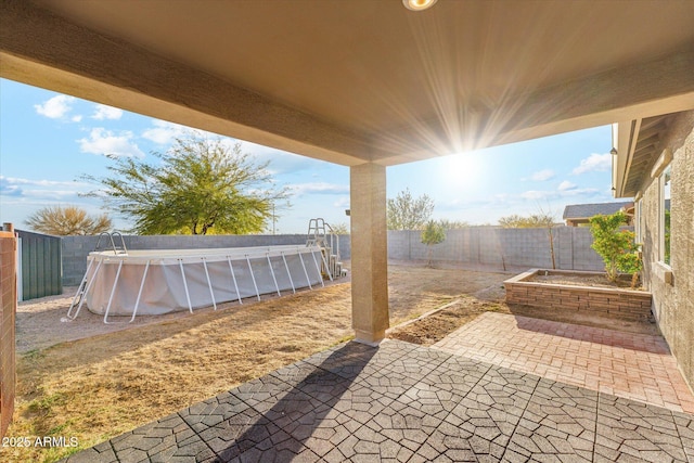 431 W Guinea Ct, Casa Grande, AZ 85122 - view of patio / terrace with a fenced in pool and a fenced backyard