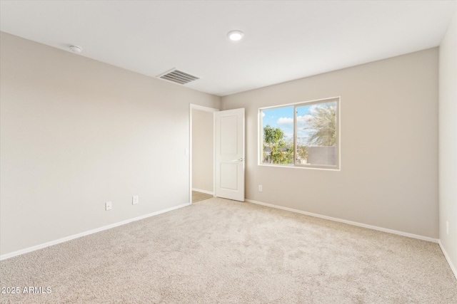 431 W Guinea Ct, Casa Grande, AZ 85122 - unfurnished room featuring light carpet, baseboards, and visible vents
