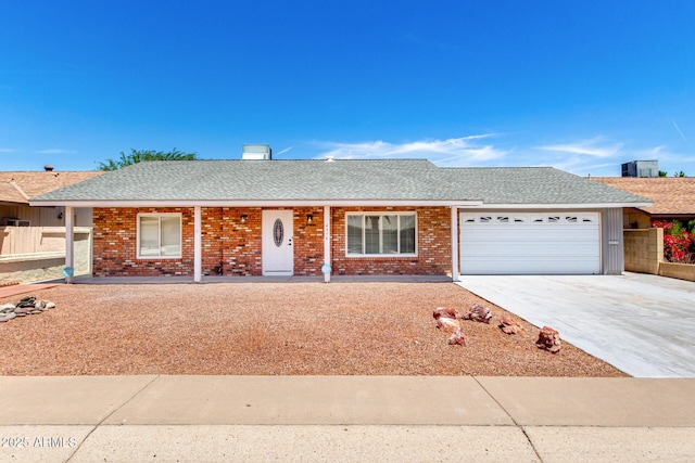 4310 E Sacaton St, Phoenix, AZ 85044 - single story home featuring brick siding, driveway, roof with shingles, and a garage