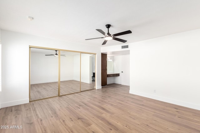 4310 E Sacaton St, Phoenix, AZ 85044 - unfurnished bedroom featuring a ceiling fan, baseboards, visible vents, and light wood finished floors