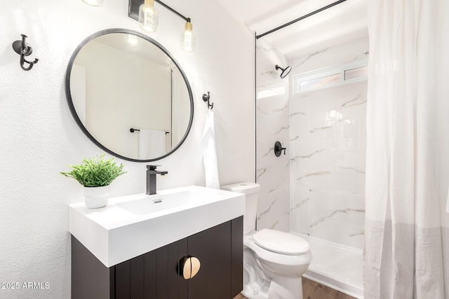 4310 E Sacaton St, Phoenix, AZ 85044 - full bathroom with vanity, a shower stall, and toilet